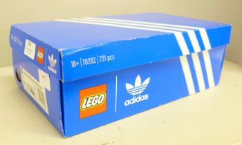 An Adidas Originals Superstar Lego kit, boxed, unopened