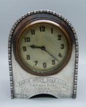 A silver fronted clock with inscription, 'Sinfin Moor Golf Club, Captains Prize, (ladies), 1925',