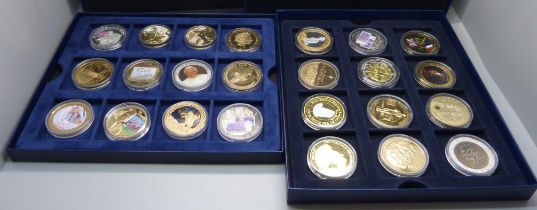 Thirty-two gold plated medallions and coins