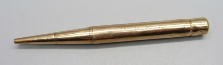 A 9ct gold F. Raker & Sons propelling pencil, initials W.S.F.J., total weight 25g, dented