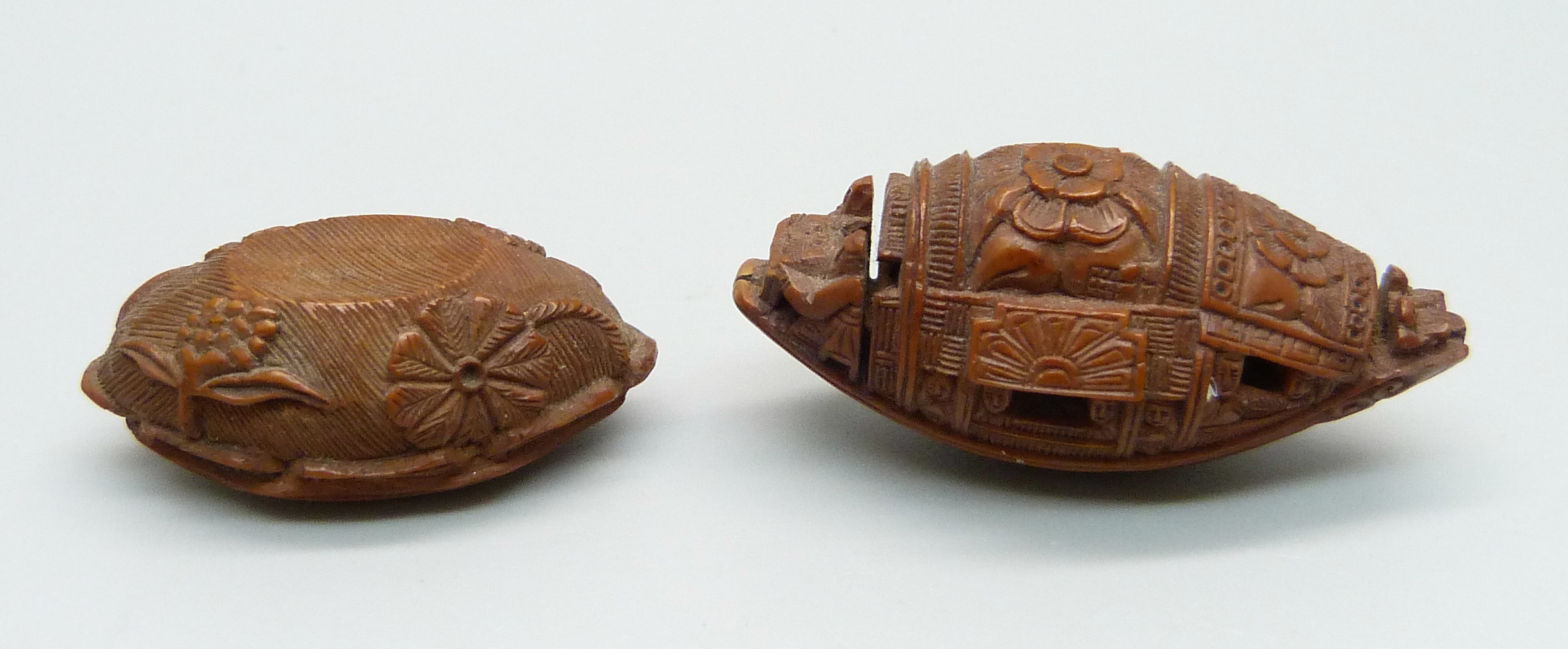 Two carved hediao nuts, one in the form of a Sampan boat with Chinese script - Image 2 of 4