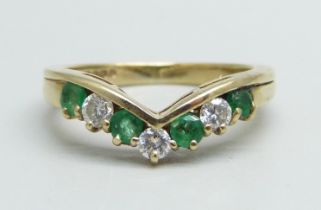 A 9ct gold, emerald and diamond wishbone ring, 2.7g, K