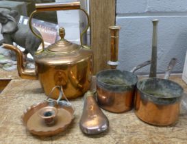A collection of copper including a kettle and a powder flask **PLEASE NOTE THIS LOT IS NOT