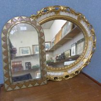 A cream and gilt framed mirror and one other