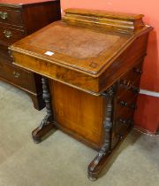 A Victorian inlaid walnut Davenport