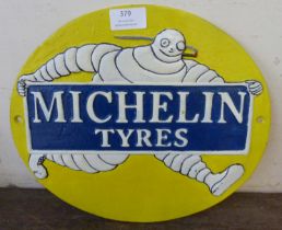 A painted cast iron Michelin Tyres advertising sign