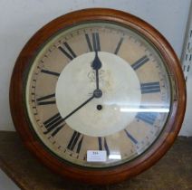 A Victorian circular mahogany Postman's fusee wall clock