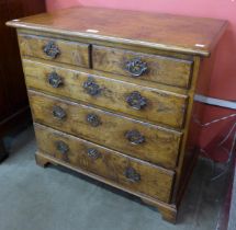 A Titchmarsh & Goodwin Ipswich oak bachelor's chest of drawers
