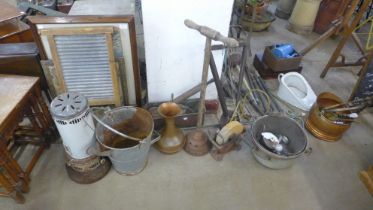 A galvanised bucket, heater, assorted pumps, copper jug, ponch, etc.