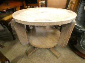 An Art Deco Heals style oak circular two tier coffee table