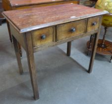 A George III mahogany three drawer lowboy