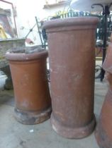 Two terracotta chimney-pots