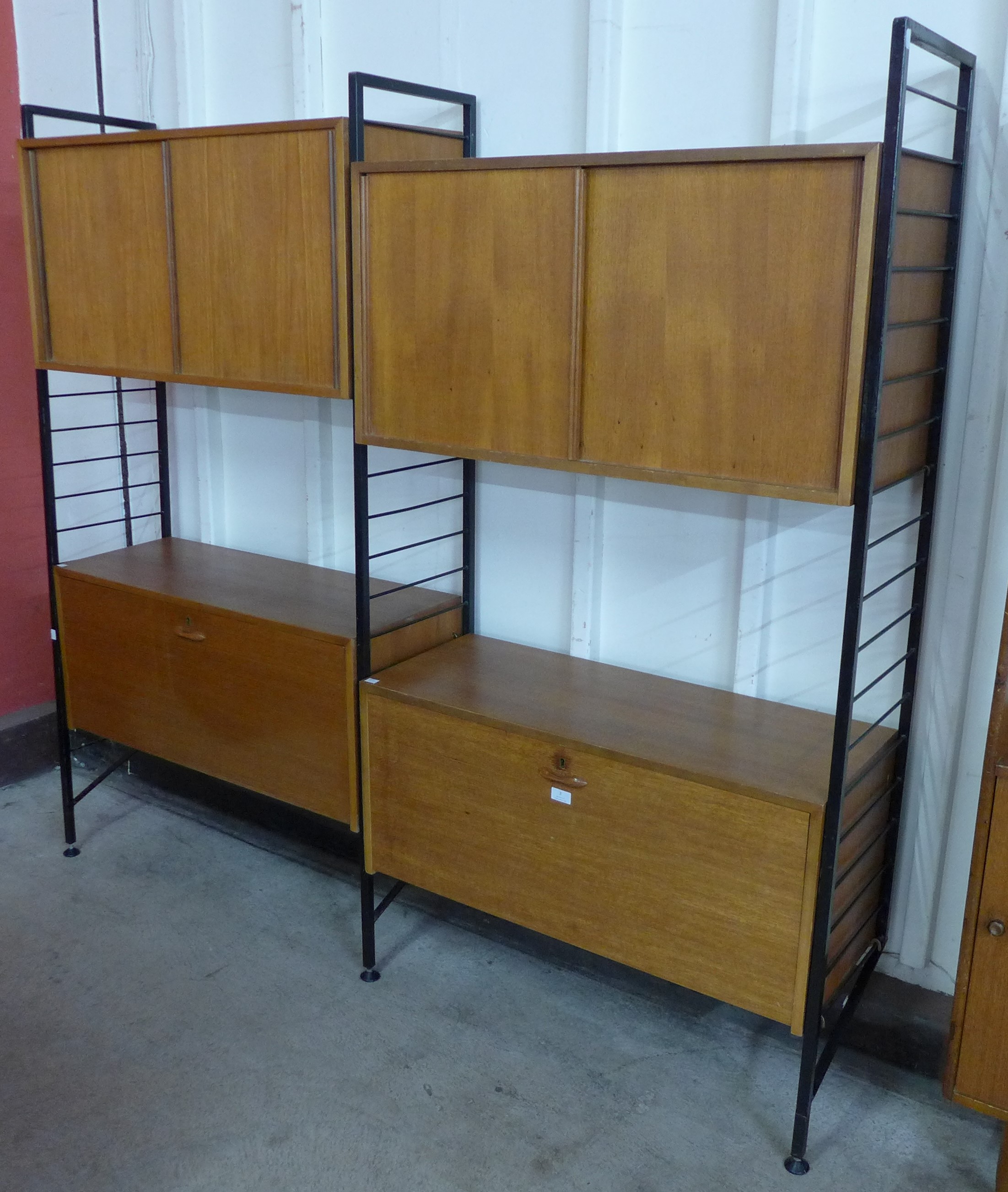 A Staples teak Ladderax room divider