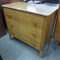 A Gordon Russell walnut three drawer chest