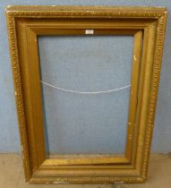 A Victorian gilt wood picture frame