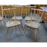 A set of four Ercol elm and beech 391 model chairs