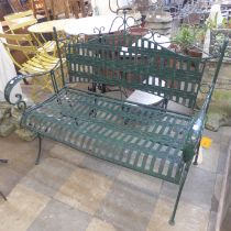 A painted wrought alloy garden bench