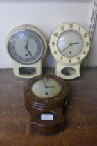 A vintage Smiths faux rosewood wall clock and two others