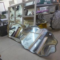 A gilt mirror, Art Deco framed mirror and one other