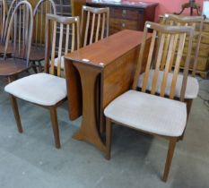 A G-Plan Fresco teak drop-leaf dining table and four chairs