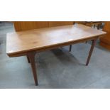 A McIntosh teak extending coffee table