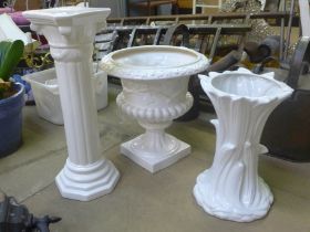 A porcelain jardiniere on stand and a campana shaped planter