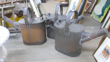 Three vintage 3 gallon oil cans