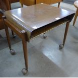 A Danish teak and tola wood occasional table