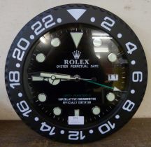 A Rolex style dealer's display wall clock