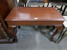 A mahogany coffee table