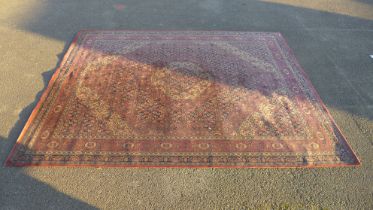 A Persian pink and blue rug, 4.1 x 3.2m