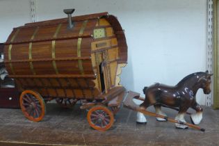 A wooden Romany Rose trailer with porcelain Shire horse