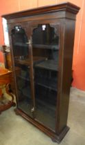 A Victorian stained pine and beech two door bookcase