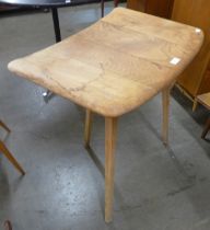 An Ercol Blonde elm and beech side table