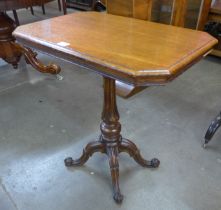 A Victorian octagonal carved oak lamp table, manner of Gillows, Lancaster