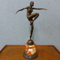 An Art Deco style bronze figure of an exotic female dancer, on rouge marble socle