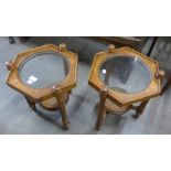 A pair of Dutch style oak and bergere jardiniere stands