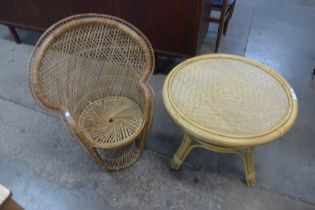 A child's wicker peacock shaped chair and a coffee table