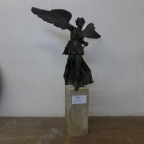 A small French style bronze figure of an angel, on stone socle