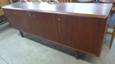 A Younger teak fitted four door sideboard, designed by John Herbert