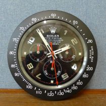 A Rolex style dealer's display wall clock