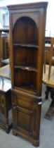 A Titchmarsh & Goodwin style Ipswich oak freestanding corner cabinet