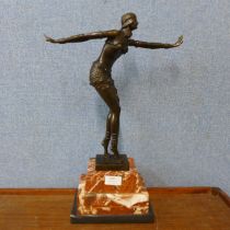 An Art Deco style bronze figure of an exotic female dancer, on rouge marble socle