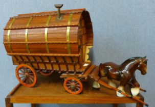A porcelain Shire horse with wooden Romany Rose trailer