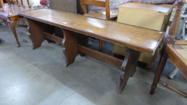 An early 20th Century oak bench