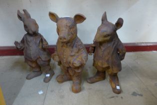 A set of three cast iron Beatrix Potter garden figures