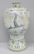 A Chinese 18th Century blue and white bottle vase, 25cm