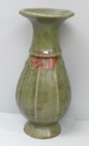A Chinese celadon vase, 18cm, chips to base