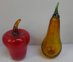 Two pieces of glass shaped as fruit