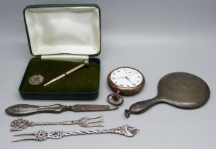 A small silver hand mirror, an 800 silver pocket watch, lacking glass, a silver golf tee pencil